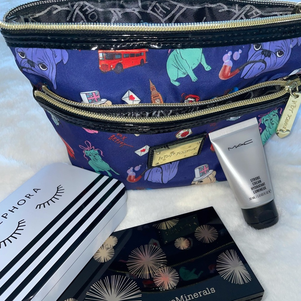 Betsy Johnson travel makeup bag.